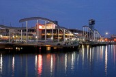spain, Barcelona, Port Vell, Rambla de Mar walkway, dusk
